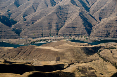 A KiwiAir helicopter tour to Waha Lake and down to the Snake River reveals the early makings of Hells Canyon.